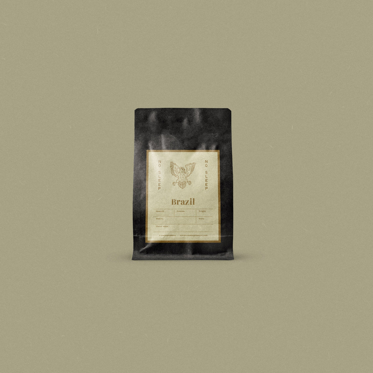 A single black coffee bag package with a cream-colored label stands centered against a solid muted olive-beige background. The label features a stylized owl logo.