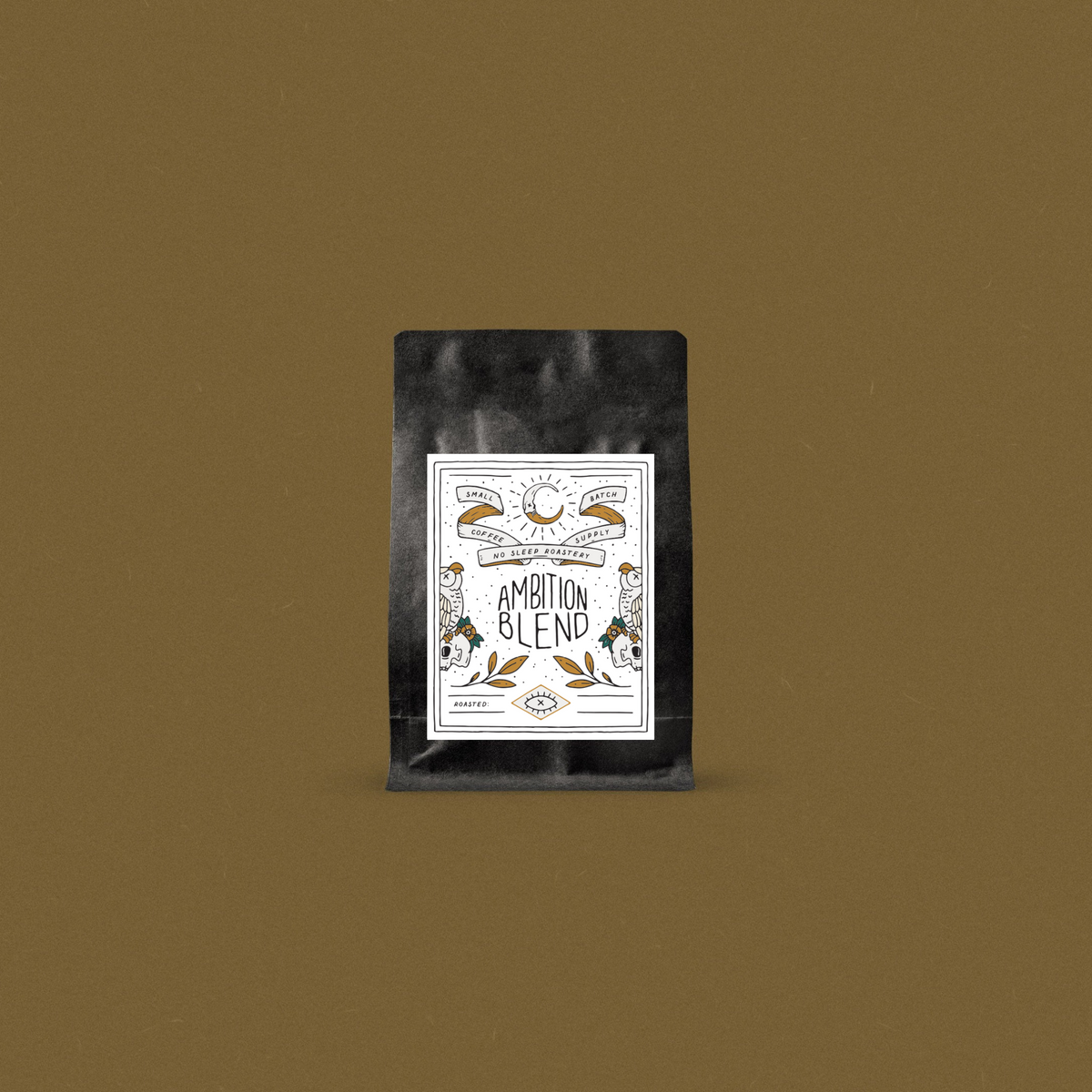 Fresh roasted coffee in a black bag with a designer label displayed on a bronze background