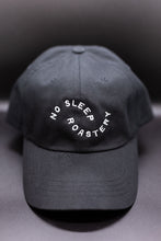 Load image into Gallery viewer, Merchandise black Dad Hat with 'No Sleep Roastery' white text embroidered